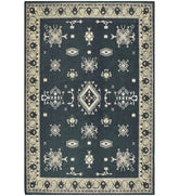 Gray tribal medallion rug with border design.